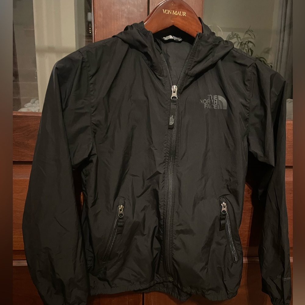The North Face Kids Black windbreaker or thin rain jacket. Medium 10/12